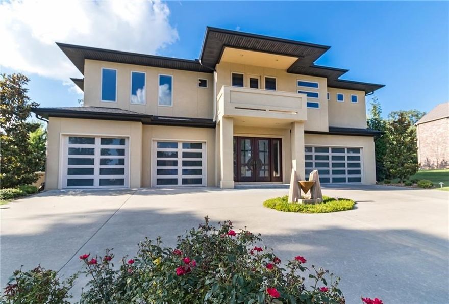 Major price reduction of $211,000. Sellers built this their dream home. They have now made a major reduction so that you can make it yours! Don't miss this once-in-a-lifetime opportunity to lavishly entertain in this well-appointed estate home. Enter the home w/a a soaring ceiling w/ skylight & well-appointed kitchen/bar for social/family gatherings or easy food prep. Another dedicated closed kitchen for culinary arts. Sunroom with all-around windows to bring in abundant natural sunlight and can be converted to screen porch in seconds. First floor polished concrete floors, second floor rosewood hardwood floor w/ cloud series carpet for theater. Counters consist of marble, quartz, & granite. 80 % built-in furniture made w/ clear coated natural maple.