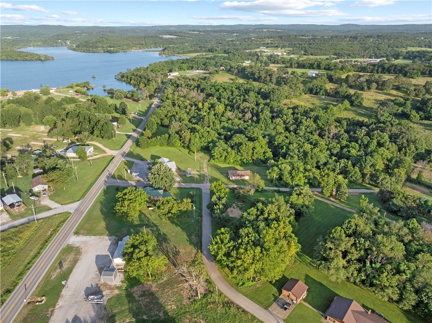 Tucked in the heart of Lead Hill, this lot gives you that quiet neighborhood feel while keeping you just 20 minutes from Harrison and 35 minutes from Branson. Bull Shoals Lake is right down the road, and everything you need is within reach—whether it’s a fishing pole or a dinner reservation.
There’s an existing well & septic system, plus access to public water and sewer at the street. (Buyer to verify utilities.)
Build your dream getaway, a full-time home, or hold onto it for later—opportunity is knocking in lake country.