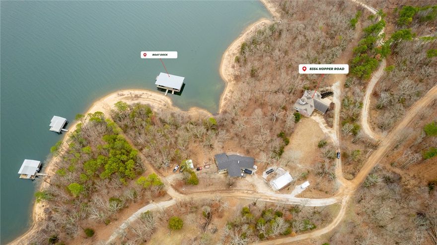 Gorgeous Beaver Lake Front Home w/2 Boats Slips on Private Co-Owned Dock! Home has been fully renovated & comes fully furnished, great turn-key investment opportunity! Located on 0.96 AC w/341 ft of shore access. You are welcomed in by beautiful views from the floor to ceiling windows in living space. Spacious living room has fireplace & surrounding built-ins, vaulted ceilings & access to deck via multiple sliding glass doors for amazing views. Kitchen boasts great amenities for entertaining, including island w/prep sink, double ovens & gas range! Sunroom is great additional living space to enjoy lake views. Primary suite on main level w/deck access, en-suite w/soaking tub, spacious shower &WIC.  Main level also has Guest room w/attached bath. Lower level has 2nd living area w/wet bar & fireplace. 2 guest rooms w/their own private baths. 2nd laundry room w/access to the 2 car garage. Covered patio for more outdoor living space & easy access to lakeshore. 2 slips on co-owned dock, one w/2021 hydro lift.