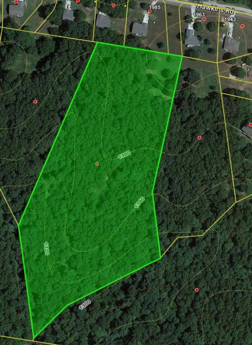 Looking for a Wooded Building Site, with City Water & Electric available? Great Building site 8.52 acres, Single frame-built home with total interior finished floor area of not less than 1200 sq ft, excluding garages. No manufactured or mobile homes shall be permitted. 5 minutes to WalMart, 30 minutes to Branson MO, 30 minutes to the Buffalo River,  Buyer to verify all utilities.