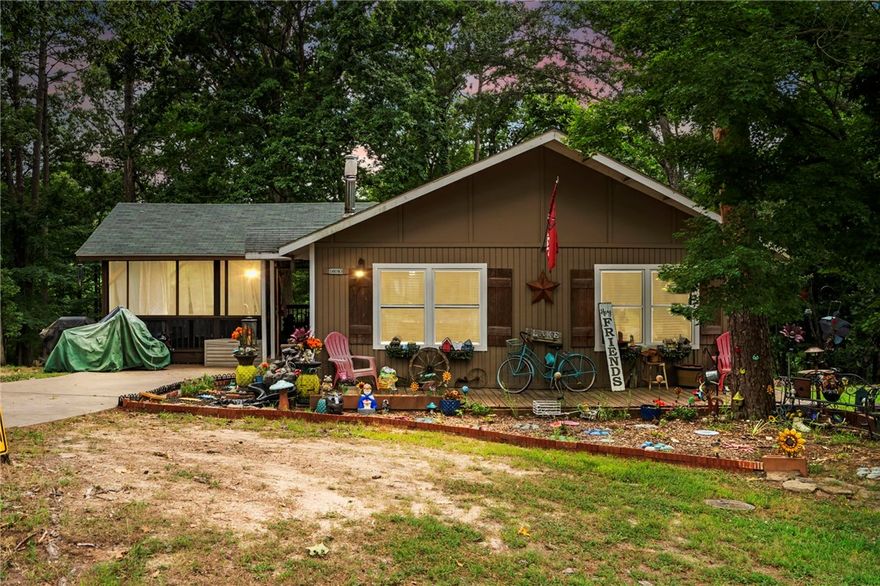 Tucked Away Near the Lake – A Hidden Gem with Investment Potential!

Welcome to 16083 Hickory Drive in the peaceful Beaver Shores neighborhood—where lake life meets everyday convenience. Situated on three spacious lots, this charming home is just a short walk to beautiful Beaver Lake, offering the perfect balance of seclusion and accessibility. 

Step inside to find cozy living spaces featuring a wood-burning stove, perfect for cooler nights, and step out to enjoy the screened-in patio—ideal for relaxing mornings or evening gathering around the outdoor firepit area. Whether you’re a first-time homebuyer looking for a private retreat or an investor seeking Airbnb potential, this home fits the bill.

Located just minutes from town, shopping, and restaurants, you’ll love the convenient location without sacrificing that “cabin-in-the-woods” feel. Homes with this much land and this close to the lake don’t come around often—come see it for yourself!