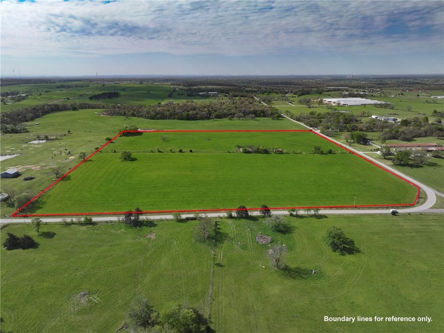 Prime level land in Decatur, AR city limits.  Discover this nearly 40 acres of cleared, level land located just inside the Decatur city limits. With paved road access on two sides and nearly a half a mile of frontage along Falling Springs Road, this versatile property offers both convenience and potential.  Currently cross-fenced into two parcels of approximately 20 acres each, the land is zoned Residential-Estate and is equipped with gas, electricity, and water utilities nearby. Existing features include a small pond, a shed, and automatic cattle waterer.  The Seller is open to considering offers for subdivided tracts. No “For Sale” sign is posted, so appointments are required to view the property and notify the Seller.  Call today to schedule a showing.  Endless potential awaits on this prime development site.