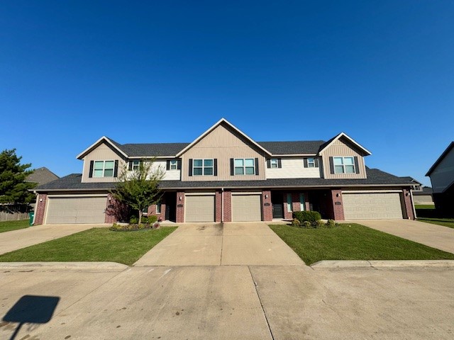 This spacious 3-bedroom, 2.5-bath townhome is located in a quiet fourplex community.  Featuring an open-concept floor plan, modern kitchen, and private back patio, this home offers comfort and convenience at every turn.  All three bedrooms are located upstairs, including a large primary suite with en-suite bath and walk-in closet. The home also includes a 1-car garage, in-unit laundry hookups, and easy access to shopping, dining, and major highways.  Lawn care is provided. Don't miss this opportunity to live in a desirable Rogers neighborhoodāschedule your tour today!  **Pics may not be of exact unit**