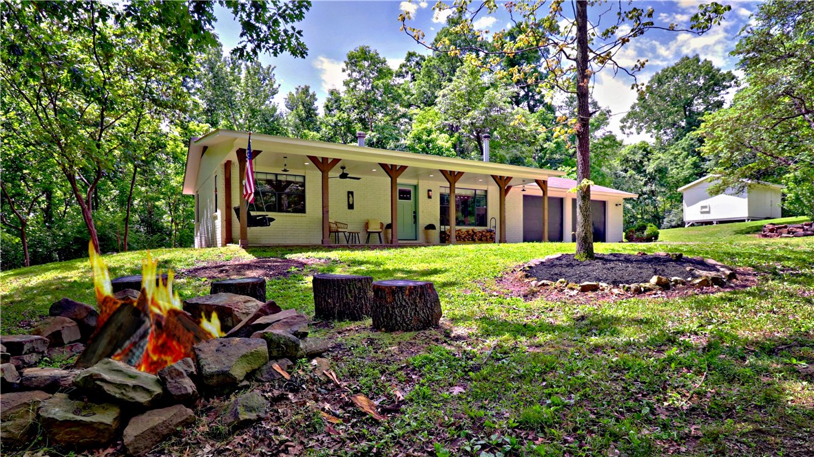 Fully remodeled 2 bedroom home on Beaver Lake. Property lines readjusted to include 15.11 acres. Gorgeous finishes to make this home comfy and cozy for those great days on the lake!
