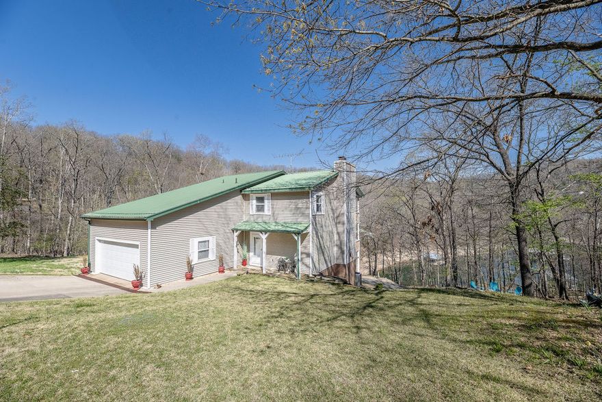 Lakefront living at its finest on beautiful Beaver Lake! This stunning lake home is tucked in a peaceful cove and includes a private boat dock with lift and solar power—perfect for easy days on the water.

Enjoy the outdoor lifestyle with a spacious firepit area, two large decks with breathtaking views, and direct lake access for boating, fishing, and swimming. Ideal for entertaining or relaxing at sunset, this property offers the ultimate lake retreat.

Turn-key and move-in ready, the interior features granite countertops, extensive custom woodwork, and a whole-house generator for year-round peace of mind. The fully refinished basement includes a bonus room—perfect for a game room, office, or extra sleeping space.

With its layout and amenities, this home also offers excellent short- or long-term rental potential. Don’t miss this rare opportunity to own your own slice of lakefront paradise! (Preapproval letter is required.)