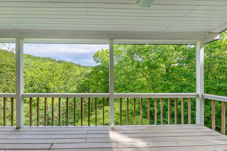 Lakefront living at its finest on beautiful Beaver Lake! This stunning lake home is tucked in a peaceful cove and includes a private boat dock with lift and solar power—perfect for easy days on the water.

Enjoy the outdoor lifestyle with a spacious firepit area, two large decks with breathtaking views, and direct lake access for boating, fishing, and swimming. Ideal for entertaining or relaxing at sunset, this property offers the ultimate lake retreat.

Turn-key and move-in ready, the interior features granite countertops, extensive custom woodwork, and a whole-house generator for year-round peace of mind. The fully refinished basement includes a bonus room—perfect for a game room, office, or extra sleeping space.

With its layout and amenities, this home also offers excellent short- or long-term rental potential. Don’t miss this rare opportunity to own your own slice of lakefront paradise! (Preapproval letter is required.)