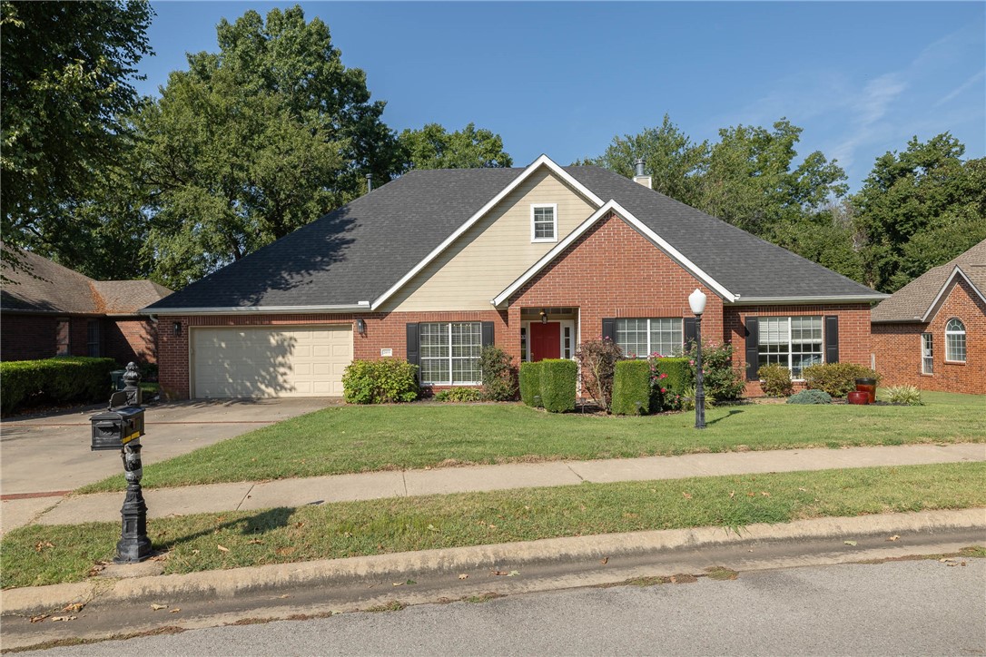 Located in one of East Fayetteville’s most desirable neighborhoods, this 6 bedroom, 3 bath home welcomes you with a bright living room featuring modern updated lighting, a cozy gas fireplace, & custom built-ins. The kitchen offers granite countertops, stainless appliances, bar seating, & an eat-in dining area that connects with the living space. French doors open to a designated office, while the main-level primary suite provides a retreat with deck access, two walk-in closets, double vanity, jetted tub, & walk-in shower. Two additional bedrooms & a full bath are also on the main level, along with a utility room with sink, cubbies, & built-ins. Upstairs includes two more bedrooms, a full bath, & a second living area for added comfort & flexibility. A huge covered deck looks onto the privacy-fenced yard, perfect for gatherings or quiet evenings, & the front is professionally landscaped. All in an active, social community close to dining, shopping, schools, parks, & trails.