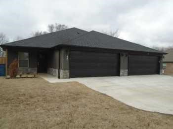 Ideally located in the heart of Gentry just South of Main Street. Just minutes from the park, library, and Gentry schools. Walking distance to McKee Plant. Open floor plan concept from kitchen to living room, walk in closets, central heat & air, granite counter tops, and a custom interior design! NO CARPET.