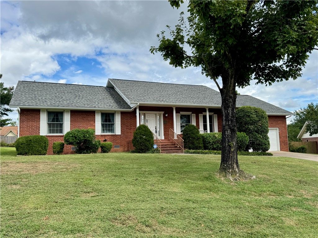 Stunning 2,153 sqft Colonial-style red brick home located on a quiet cul-de-sac in sought-after Campbells Countrywood Estates! Quality-built with 2x6 construction and well maintained, this beautiful home offers 3 bedrooms, 2.5 baths, a formal dining room, and a flexible 2nd living areaāideal for an office or bonus space. The expansive main living room showcases wood beams, rich wood accents and trim, and a cozy wood/gas-burning fireplace. The eat-in kitchen features a breakfast bar, built-in desk, and abundant cabinet space. The spacious primary suite includes a bath, walk-in closet, and built-in desk, with insulated interior walls for extra comfort. Tile and carpet throughout. Outdoor living includes a welcoming front porch, landscaped yard, private deck, and backyard.
Location, location, location!
Perfectly located near schools in walking distance, trails, parks, NWA Greenway, and only minutes to downtown Rogers and the Uptown Promenade!
Storage building, refrigerator, washer/dryer, and drapes convey.