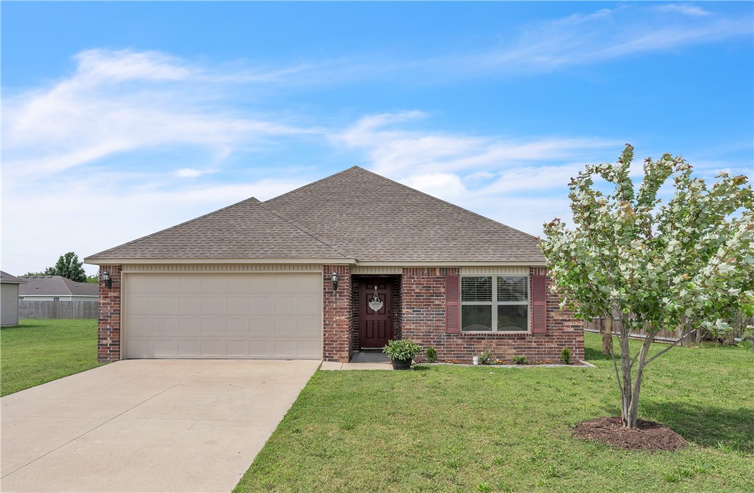 This lovely home in the charming town of Elkins offers country living with nearby amenities and is eligible for a $0 down payment RD loan. Within a 2 miles radius, there are several essentials and attractions such as Elkins public schools, Harps grocery store, Dollar General, gas stations, restaurants, the White River, Bunch Park, and the Elkins Community Center. And Fayetteville and the University of Arkansas are a short drive away. The home's features include a covered patio, semi-open concept, luxury vinyl plank flooring in the main areas and bathrooms, eat-in kitchen with pantry and Frigidaire stainless steel appliances, spacious bedrooms, and a well-appointed primary suite with a large walk-in closet, walk-in shower, soaking tub, and long vanity with ample storage. Fridge, washer, and dryer are possibly negotiable.