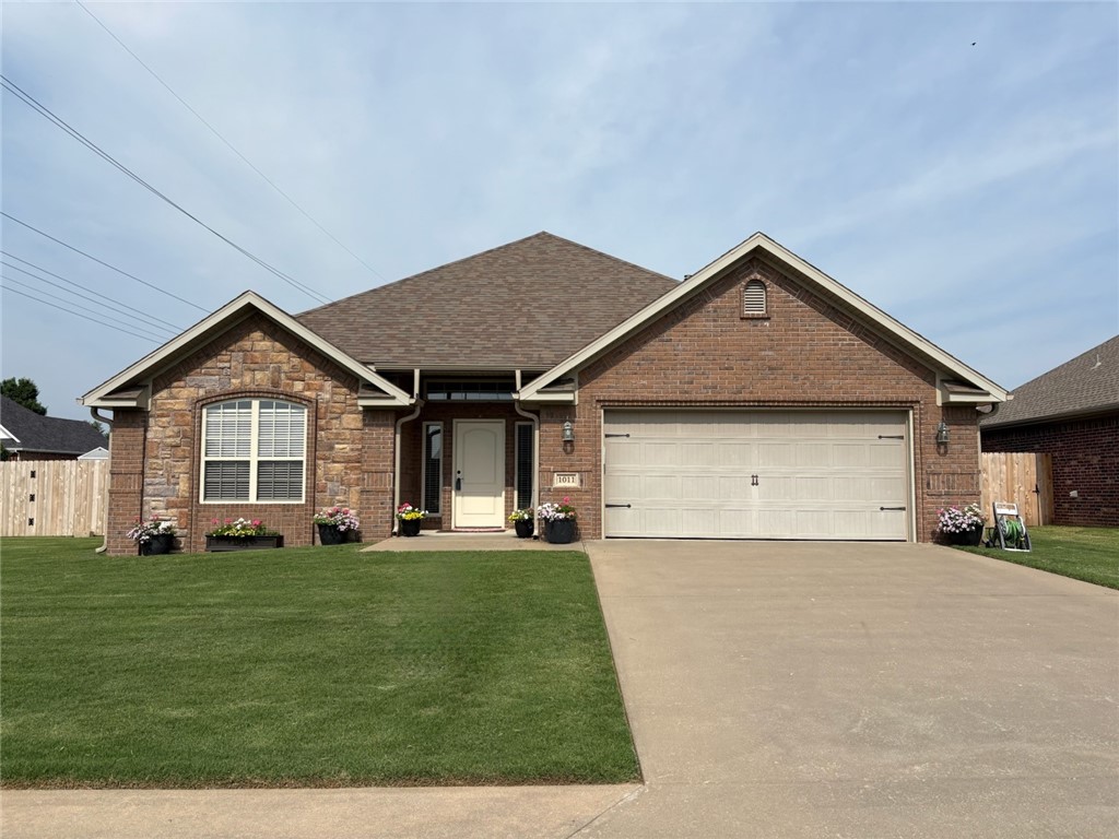 This move-in-ready 2010 home is well-maintained. The upgrades will give the new owner peace of mind for many years to come. New in 2019: Dishwasher, Gas Stove/Oven, and Interior Paint. New in 2020: Trane A/C Furnace. New in 2021: Roof. New in 2022: Garage Door Opener, New in 2024: Spring on Garage Door, Screen Door, Garbage Disposal, and complete fencing on 3 sides of backyard. A double gate on the front side allows for RV parking. Beautiful Brick home with some rock facade on a flat lot in a peaceful neighborhood near a pond and a playground. The backyard has plenty of room for entertainment dreams or even a pool. The front and back are landscaped and well-maintained. High school and elementary school are less than a mile away, but far enough to avoid noise. Upon entrance, you walk into a beautiful foyer with tile that transition onto wood flooring. Once in, you see the main living room with a gas fireplace and elegant crown molding. Home is a split floor plan with Primary towards the backyard. home is ready now.