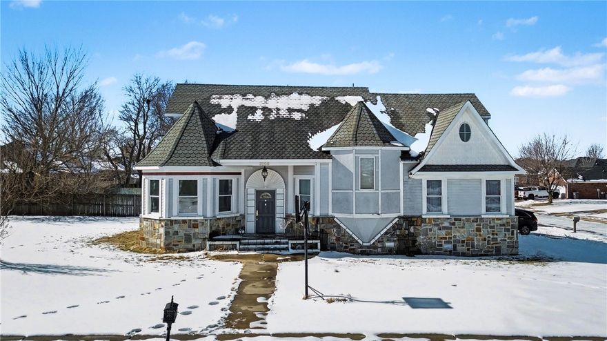 The Kennesaw Castle is available and ready for its new royalty! The most unique house in Springdale can now be yours! Located on a large corner lot with awe inspiring architecture, the real treasures are inside. When you enter the extremely large and spacious home you will be astounded by the features that this home has! Marble flooring, gas fireplace, built in appliances in the kitchen, separate dining, built ins, crown moulding, beautiful woodwork, whirlpool tubs, and SO MANY ROOMS! Aside from the 3 large bedrooms, there is a bonus room that can be used for a game room or guest suite featuring its own kitchenette and wet bar! Additional rooms can be used for hobbies, entertaining, and let's not forget  tons of storage! This home must be seen to be appreciated. Outside you have a large corner lot with a covered composite deck for relaxing and entertaining. If you are looking for a one of a kind home to make your own this is it. Awe inspiring and ready for your vision to make it your new castle!