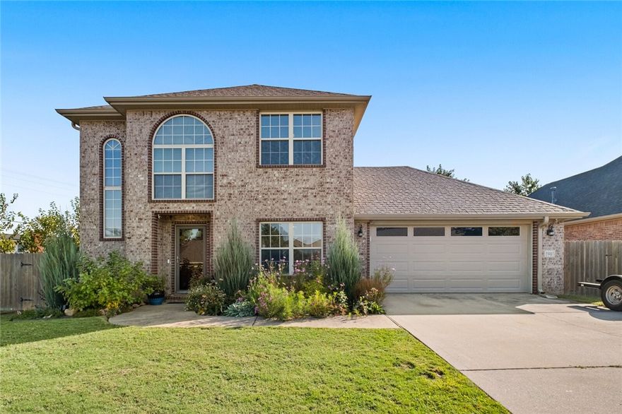 Discover this charming 3-bedroom, 2.5-bath home at 1905 W Countryside Ln in Rogers! This two-story brick beauty features a spacious layout, cozy living room with gas fireplace, and a warm and inviting kitchen with custom touches. Stainless steel appliances & lots of cabinet storage in the kitchen. Fantastic split floor plan with owner's suite downstairs and a large upstairs layout, perfect for families. Enjoy the large fenced backyard with pergola-covered deck, firepit area, and space to relax or entertain. Located just minutes from the Razorback Greenway, Hobbs State Park, and Pinnacle Hills Promenade. Close to Topgolf, the AMP, and fast-growing dining spots like Big Orange and Local Lime! A perfect balance of comfort, location, and lifestyle!