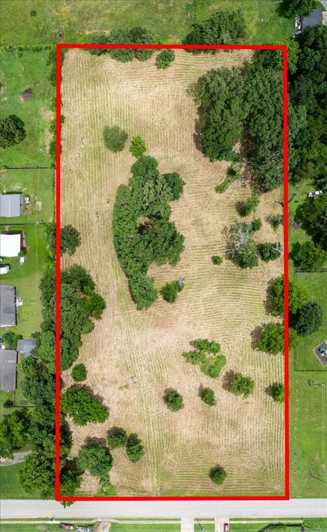 5-acre parcel, development potential. Flat, utilities at street. Seller will not sell individual parcels. This 5 acre offering is made up of 3 parcels equaling 5 acres.