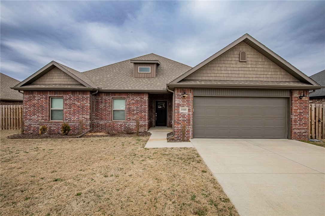 Great home in Hazelton Heights Subdivision. This 4 bedroom 2 bath home features wood style ceramic tile flooring throughout main living area. Open floor plan with lots of windows, gas fire place in living room, granite counters in kitchen and baths. Stainless appliances. Split floor plan. Covered porch area opens into a large fenced yard.
