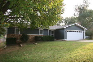 Cute & clean 3 bedroom, 2 bath home on a lovely lot with mature trees and a shed. This home is like new and ready for you to move in. It offers a covered back deck, fenced back yard, 2 car garage with opener, master bathroom, beautiful laminate & tile flooring, and is all on one level. Wonderful location in a great neighborhood near local shopping & eateries.