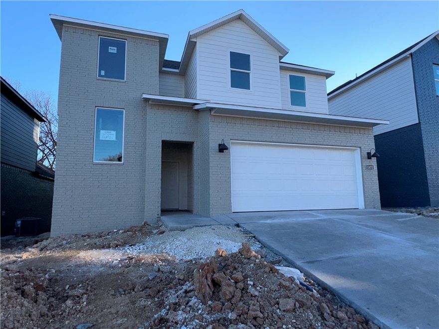 The Lovely Pierce plan in Pine Hollow by D.R. Horton! This community offers two story homes with spacious living areas, perfect for entertaining and everyday comfortable living. This home features 4 bedrooms, 3.5 baths, and a game room upstairs! You’ll enjoy a beautiful modern electric fireplace with a poplar mantle in the living room!  Full oak Tread Staircase with black modern handrails-Bathroom 1 will be tile flooring- Beautiful Wood Laminate click LVP first and second floor! In the kitchen, you’ll find stunning quartz countertops, tile backsplash, and a gas range. The primary bedroom has an ensuite complete with quartz countertops, dual sinks, freestanding tub, a walk-in shower with tiled walls!  The living room, each bedroom, and game room will have a fan. Home exterior features painted brick and Hardie® siding  (per plan).  Covered patio (per plan). The programmable thermostat allows you to effortlessly control your environment with the touch of a button! Taxes and parcel TBD.