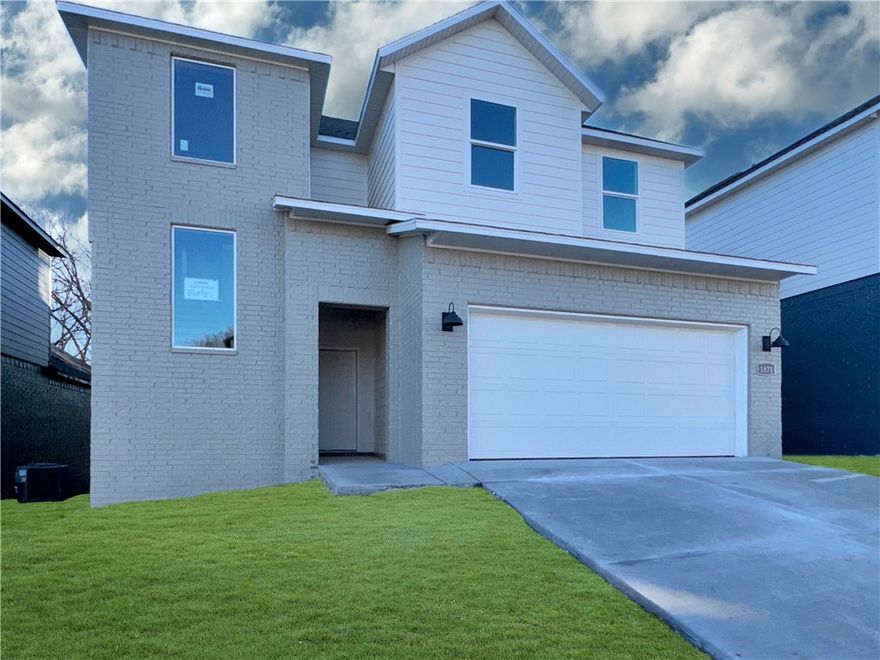 The Lovely Pierce plan in Pine Hollow by D.R. Horton! This community offers two story homes with spacious living areas, perfect for entertaining and everyday comfortable living. This home features 4 bedrooms, 3.5 baths, and a game room upstairs! You’ll enjoy a beautiful modern electric fireplace with a poplar mantle in the living room!  Full oak Tread Staircase with black modern handrails-Bathroom 1 will be tile flooring- Beautiful Wood Laminate click LVP first and second floor! In the kitchen, you’ll find stunning quartz countertops, tile backsplash, and a gas range. The primary bedroom has an ensuite complete with quartz countertops, dual sinks, freestanding tub, a walk-in shower with tiled walls!  The living room, each bedroom, and game room will have a fan. Home exterior features painted brick and Hardie® siding  (per plan).  Covered patio (per plan). The programmable thermostat allows you to effortlessly control your environment with the touch of a button! Taxes and parcel TBD.