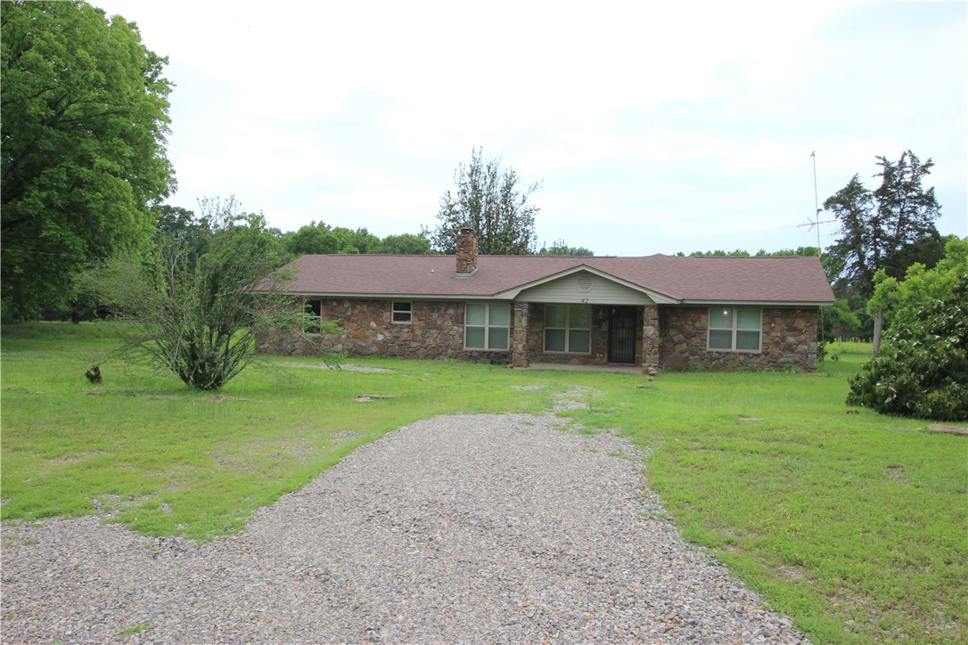 This is a unique situation for the perfect person. 4.5 with a huge 60x 80 Commercial Building that could be
a Semi Truck Repair, An event center, a car storage for about 12, it has a 1/2 bathroom and storage are plus workshop area. The house has been totally upgraded in the interior with brand new vinyl thermal windows, new roof, new sheetrock with all new wood look ceramic tile throughout, new kitchen appliances, tile countertops, a living room with a fireplace insert, a sunroom, or extra living space, a huge laundry with massive storage areas, and a pantry room beside it. New paint, and all popcorn ceiling remove. Come and see what you can do with this homestead. Run a business out of the huge shop, rent it out.. lots of possibilities