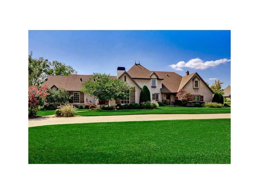 Entertainer's Delight! Gorgeous setting. Open, bright floor plan. Gourmet eat-in kitchen with a wall of windows to view the private, in-ground, heated pool. Sit by the fireplace on the cozy covered patio and watch nature. Massive media/game room on the, main level. Huge master suite. True 5 bedroom home with an exercise room, formal dining, and study/office. Real stucco exterior. So much to offer. Private Luxury Estate!