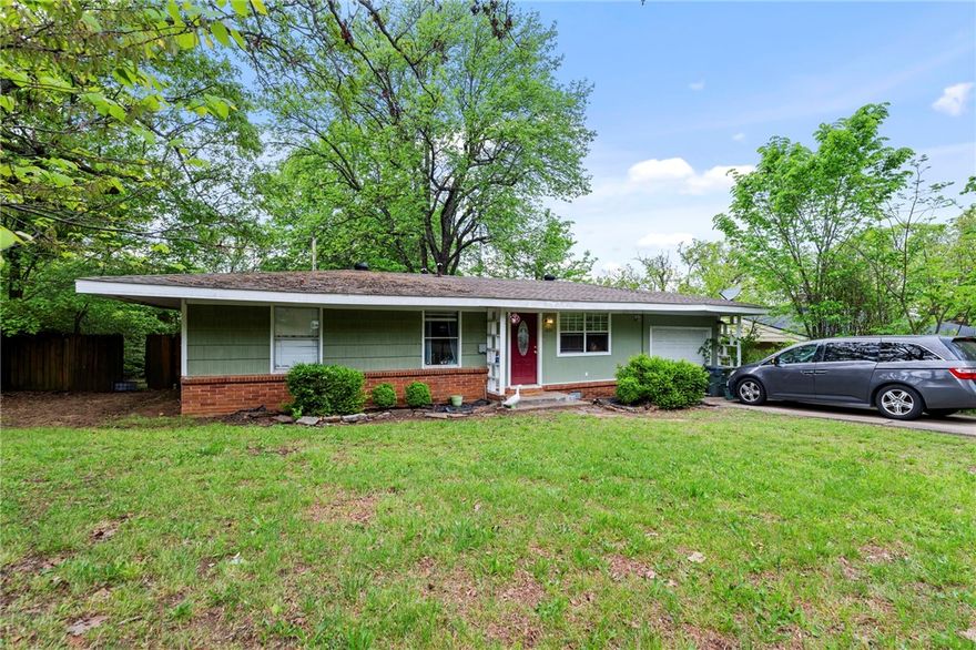 Welcome to 1231 N Oak Avenue, a charming home just 3 minutes from the University of Arkansas & 10 minutes to Northwest Arkansas Mall. This property boasts hardwood floors throughout. The eat-in kitchen is perfect for family meals, while the deck in the backyard provides an ideal space for outdoor relaxation & entertaining. Conveniently located near a variety of Fayetteville’s top amenities, this home puts you in the heart of it all. Enjoy quick access to local shops, restaurants, parks, & more. Whether you're a student, professional, or anyone in between, this home offers the perfect balance of comfort, location, & style.