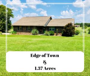 Cute home on the edge of town with 1.37 acres! You can enjoy the luxury of being outside seeing the beauty of nature while on the back deck! This home has a open concept floor plan with 3 bedrooms and 2 full bathrooms! You can enjoy cooking in the open kitchen and will have additional counter space with the island that is made out of butcher block.