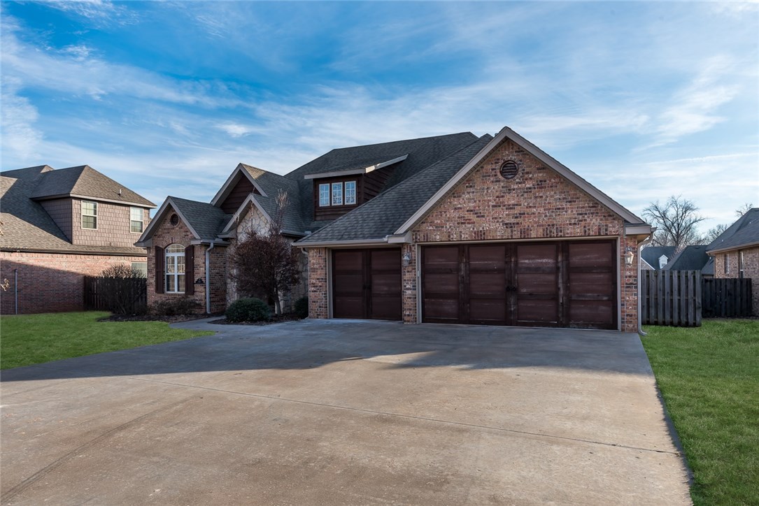 Beautiful home in a great community! Located close to shopping, dining, and XNA Airport. This home features an excellent layout, with a flowing floor plan great for entertaining! Formal dining room with large window and wood floors is located off the entry. On the other side of the entry is an office with a brick accent wall, french doors, and wood floors. Large living room has stone fireplace and is open to the eat-in kitchen. Breakfast nook has lots of natural light and access to covered deck and the huge privacy fenced backyard. Kitchen features granite tops, counter bar seating, and stainless appliances. Spacious master bedrooms has attached bath with walk-in shower and jacuzzi tub as well as a walk-in closet. Two additional bedrooms provide plenty of space.