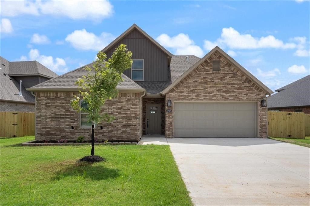 Welcome to 6505 Acacia St, a beautifully designed West-facing new construction home nestled in a brand-new Bentonville subdivision. This home offers the perfect blend of modern luxury & everyday functionality, all just minutes from Vaughn Elementary, XNA airport, grocery stores, gas stations, & more! The kitchen features granite countertops, abundant cabinetry, & floating shelves. The living area boasts a cozy gas fireplace. The master suite is a true retreat, with a spa-like bathroom featuring a soaker tub built into the walk-in shower, creating a seamless & luxurious experience. Every detail in this home has been thoughtfully designed to create a comfortable, stylish living space.