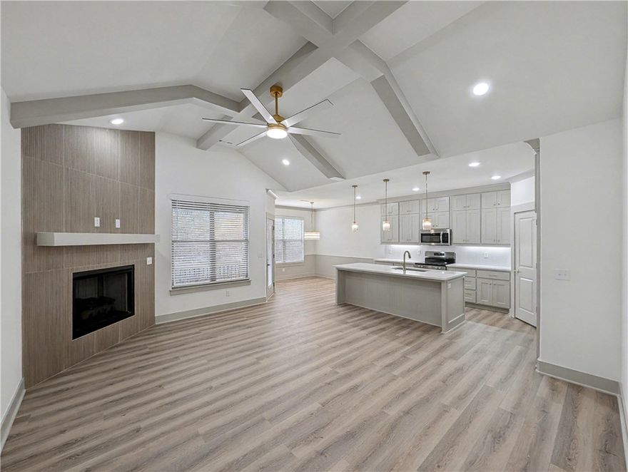 Welcome To Your Next Home! Picture It — A Fresh New Build With A Classic Brick Front, A Smart Split Floorplan, And 9-Foot Ceilings That Make Every Space Feel Bright And Open. The Living Room Steals The Show With A Vaulted Ceiling, Beams For That Extra Drama, Flowing Seamlessly Into A Kitchen That’s As Functional As It Is Stunning — Upgraded Cabinets To The Ceiling, Quartz Counters, Tile Backsplash, Island With Bar Seating, Pantry, And A Spacious Dining Area. The Primary Suite Offers A Dual Vanity, Full Custom Tile Shower, And A Walk-In Closet That Cleverly Passes Through To The Laundry/Utility Room For The Ultimate Convenience. Thoughtful Storage Is Tucked Throughout, And Out Back You’ll Find A Covered Deck Overlooking A Future Freshly Sodded Yard And Peaceful Views. Branchwood Rec Center And Nature Trail Close By. Pick Your Interior Finishes. Finished Pics As Example Of Previous Build. **Deeded As 2 Bed Septic, 3rd Room To Be Considered Office/Bonus Other Non-sleeping Room. Signed acknowledgment required.