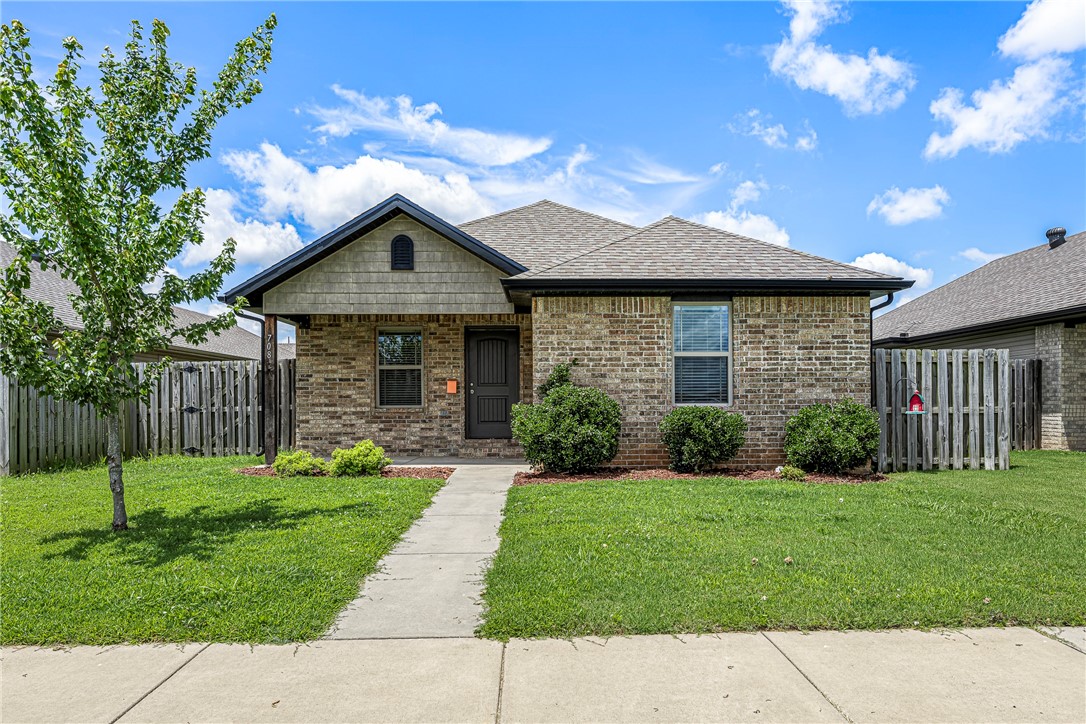 Welcome home! 2016 well maintained and like brand new home in a desirable location. Within walking distance of schools. Minutes away from downtown Bentonville, trail system, shopping, and I540 for easy daily commute. Home features; 3 Bedrooms, 2 Bathrooms, split floor plan, Utility Room, 2 car garage, & patio off side of home. Living Room with vaulted ceilings and natural lighting. Eat-in kitchen features granite counter tops, double stainless sink, & pantry. Primary suite features vanity w/ full mirror and enormous walk-in closet. Vinyl & brick maintenance free exterior. Excellent potential for long- or short-term rental.