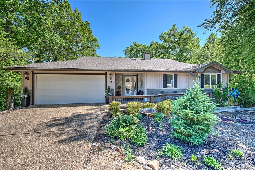 Tucked into the natural beauty of Bella Vista, this well-maintained two-level home offers 3 bedrooms and 3 full bathrooms. The main level welcomes you with a warm, inviting atmosphere and flows seamlessly into an all-seasons room—perfect for additional dining space, morning coffee, or enjoying the surrounding views year-round. The kitchen has been thoughtfully updated with new quartz countertops while the bathrooms feature refreshed, modern finishes that enhance the home’s overall appeal. Downstairs, a spacious entertainment and hangout area provides the perfect retreat including a private bedroom and full bathroom, making it a perfect setup for guests, extended family, or even a quiet home office suite. Major updates have already been taken care of, including a new roof and water heater installed in 2019, along with a recently replaced furnace—giving you added confidence and value. Whether you're looking for a full-time residence or a peaceful getaway, this home offers space, versatility, and thoughtful updates.