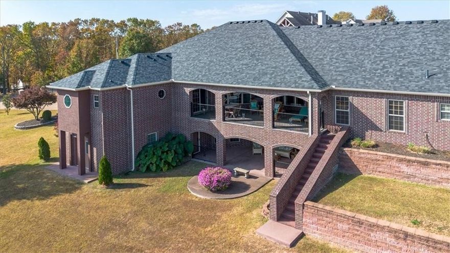 Nestled on 2.15 acres, this exquisite estate home in the highly coveted, gated, South Mountain Estates on
Beaver Lake exudes both luxury and relaxation! Whether you want to fish or swim off the private
community dock, head out on the lake; boat slip #11 conveys with home (10 ft wide x 26 ft long); relax in
the game room, or enjoy your morning coffee on the beautiful veranda overlooking the sunrise on Beaver
Lake - this home has it all! The spacious kitchen with top of the line custom finishes and a floor plan that
offers the perfect setup for indoor/outdoor entertaining of friends and family on two large verandas with
great views. Huge workshop; with garage doors on both ends. Whole home generator that conveys. All
paved roads and less than 20 minutes to town. Perfect rare combo of lake living with convenient
shopping/restaurants close by! Four newer HVAC Units less than 2.5 yrs. old; roof less than 2 years old.
Amenities list attached! View a special tour of this home here: https://vimeo.com/1100707636