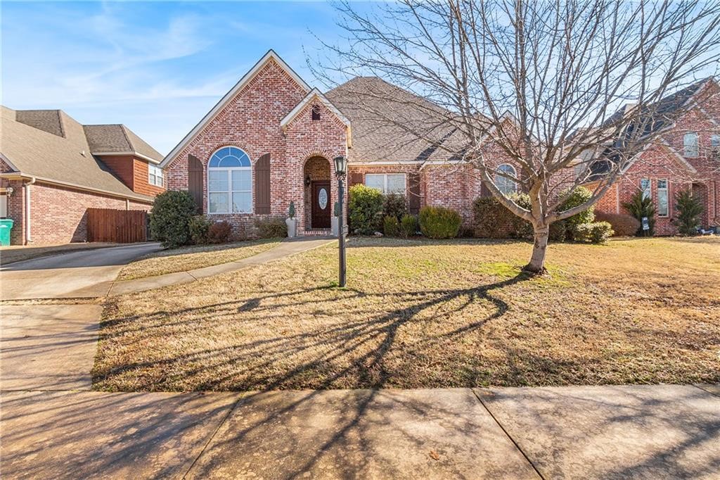 Absolute phenomenal location in Har-Ber School District in middle of NWA! Your journey starts in the inviting entry as off to the left is a bedroom with it's own bathroom. Continue on to master bedroom with double tiered tray ceiling and ensuite with dual vanities, shower, jacuzzi and large walk-in-closet with built-ins. Heart of the home is huge open living room with magnificent fireplace and soaring ceilings that opens to the gorgeous kitchen with unique suspended cabinets with double sided glass, granite, island, double oven and plantation shutters. Flex room off kitchen currently the fish room could be dining room, office or workout room. A separate laundry room, built in desk under stairs and two bedrooms sharing a Jack and Jill round out downstairs. Upstairs adds a bonus room with closet and bathroom, could be 5th bedroom, and media room with projector and screen. Relax out back in hot tub under covered patio. Private garage in rear of home. Roof, upstairs AC and furnace new in 2020 and water heater new 2023.
