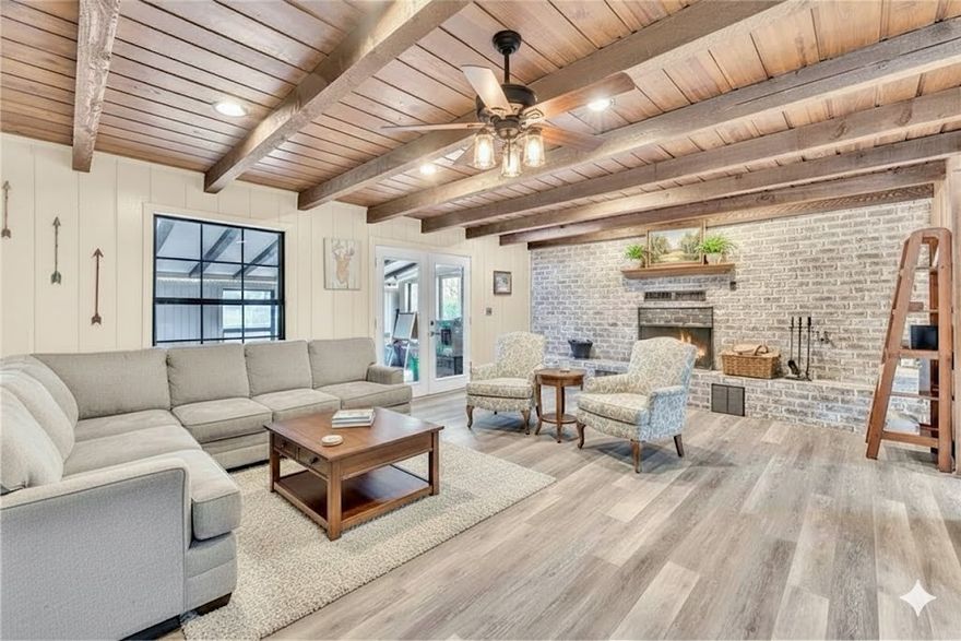 Looking for privacy while still close to town & amenities? Look no further! This 2,121 sq ft, 3-bed 2.5-bath home blends timeless character & thoughtful updates with room to make it your own. The entryway showcases brick flooring, repurposed from Farmington’s historic firehouse, setting the tone for the unique details found throughout. The spacious living room, anchored by a wood-burning fireplace, flows seamlessly into an eat-in kitchen & a dedicated dining area. Built-ins separate the kitchen from the dining area, adding charm & extra storage. Off the kitchen, the laundry room w/ pantry space provides backyard access & a half bath adds everyday convenience. The primary suite is a cozy retreat with an ensuite, fireplace, recently renovated walk-in closet & functional shutters.Through double doors off the living room, you'll find a sunroom overlooking the backyard, where a dry creek adds scenic charm. With beautiful details & an inviting layout, this home offers comfort, character & convenience all in one.