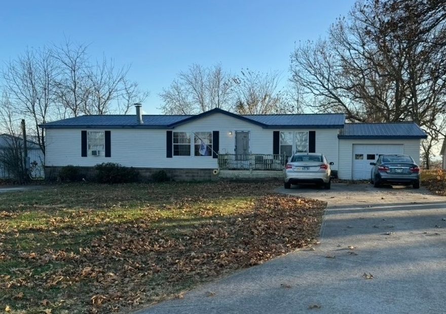 3 BR 2 BA manufactured home with a 1 car attached garage on 0.79 m/l acres just south of Bergman, AR.