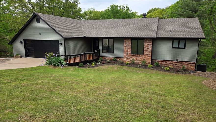 This one has the space you’ve been looking for—two living areas, a walk-out basement, and updates throughout, including a new roof, siding, garage door, and luxury vinyl flooring. The main level offers a large living and dining area, a wood-burning fireplace in the family room, and an updated kitchen with new appliances. Upstairs has two bedrooms and 2.5 baths, while the lower level features two additional bedroom spaces, a full bath, and a great room. The oversized garage even has room for a golf cart or motorcycle.