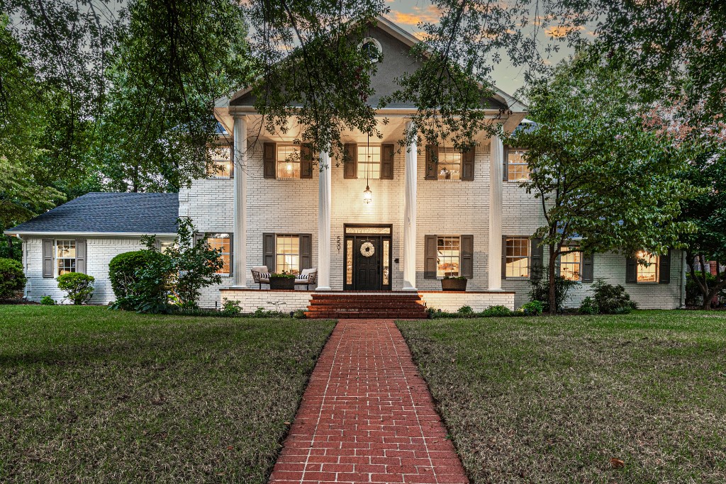 Tucked away in a tranquil neighborhood, this breathtaking modern colonial offers a serene escape. With its stunning faƧade and majestic mature trees, this home has been renovated with a fusion of timeless charm and modern flair. As you step inside, you'll be greeted by a sophisticated formal living room/office, perfect for remote work or reading a good book. The stylish dining room is ideal for hosting dinner parties or casual family gatherings, and the sunroom is a bright and airy retreat, perfect for sipping coffee and enjoying the morning light overlooking the sparkling pool. The expansive master suite is a true oasis, boasting private pool access and an ensuite bath with heated floors ā the perfect retreat after a long day. The second floor reveals two generously sized bedrooms, an elegantly appointed full bath, and a second master with ensuite bath. With its prime location just minutes from I-49, Lake Fayetteville, and the up-and-coming Johnson Square, this is a rare gem waiting to be claimed.
