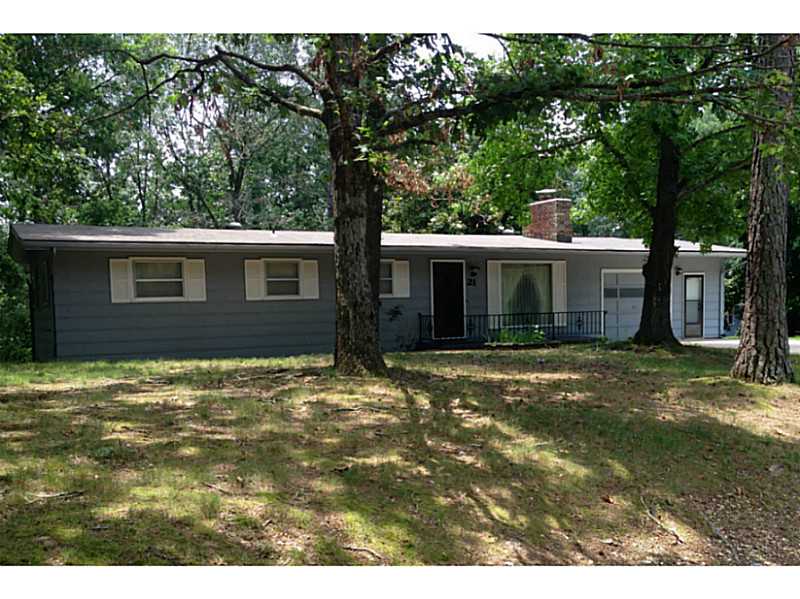 THIS HOUSE IS WAITING FOR YOUR PERSONAL TOUCH TO MAKE IT A HOME. 3BR/2BA, OVERSIZED GARAGE WITH LOTS OF ROOM FOR PROJECTS. WOODBURNING STOVE, SUN PORCH, QUIET NEIGHBORHOOD.