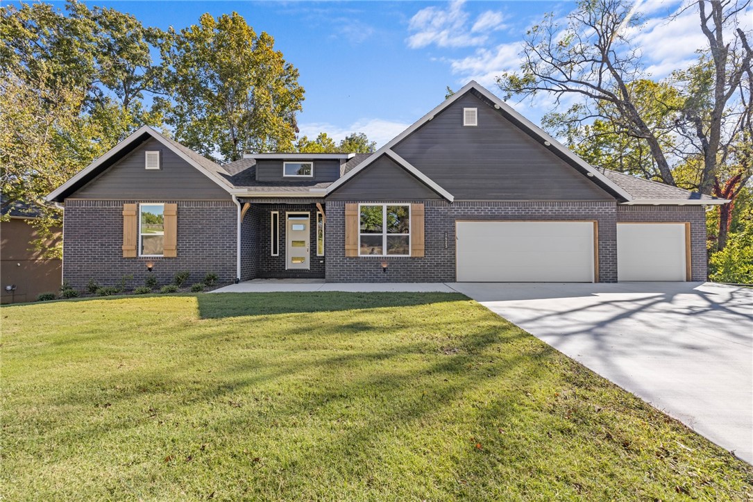 Take a look at this amazing new construction basement home is located in the beautiful Sugar Creek community in Pea Ridge, just up the street from the golf course! The main floor boasts the owner's bedroom, a guest bedroom, two well-appointed bathrooms, a pantry, a mudroom, a spacious kitchen, a dining room, and a living room. You'll find two additional bedrooms, a bathroom, and a bonus room on the basement level. This home features an excellent floor plan with top-quality amenities, stylish finishes, and an unbeatable location close to all NWA has to offer! Enjoy a one-year golf membership is included with your new home!