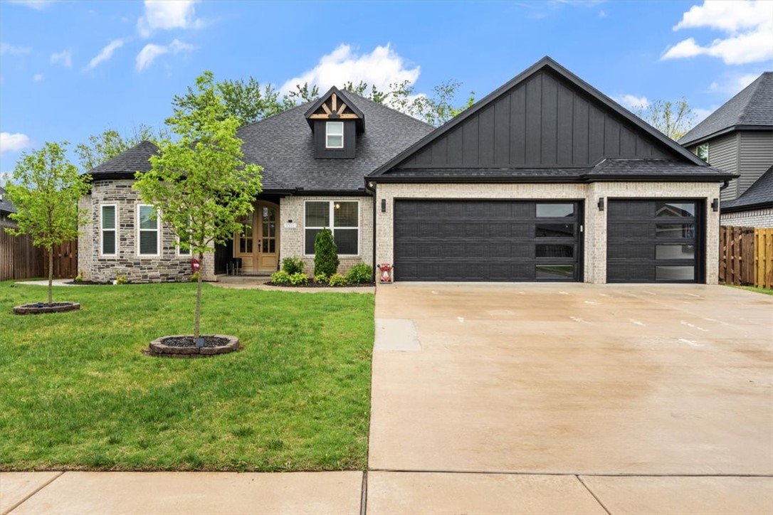 Welcome to this stunning 2023 custom-built home that blends modern elegance with thoughtful design. This 3-bed, 2-bath home boasts a spacious open-concept layout with an eat-in kitchen featuring a butcher block island, abundant cabinet space, & a built-in wine rack ā perfect for entertaining. Natural light pours into the living spaces, highlighting upgraded flooring & sophisticated finishes throughout. The master retreat is a true sanctuary, offering a window nook, a luxurious soaker tub, a custom tile shower, & a large walk-in closet. Thoughtful touches like backlit mirrors & high-end fixtures elevate the space. Step outside & enjoy the large covered patio with a cozy fireplace & an extended patio in the backyard featuring a built-in grill. Additional highlights include a bonus room/office space, an oversized laundry room/mudroom for extra storage, & a layout designed to enhance everyday living. Donāt miss the chance to call this exceptional home yours, located in one of Bentonvilleās most desirable areas.