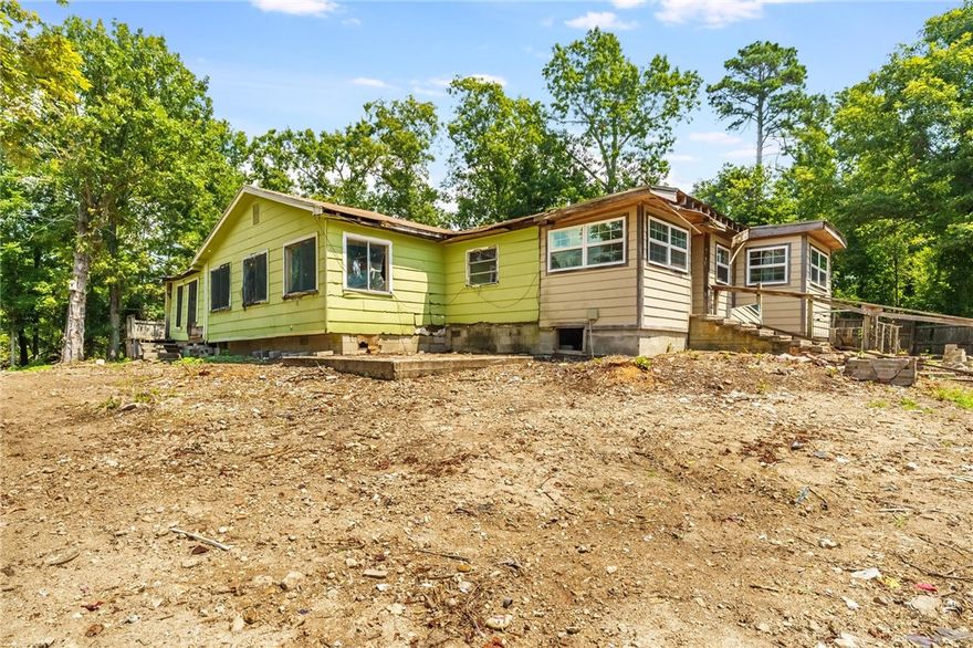 Calling all investors! Checkout this Beaver Lake area home on half an acre for your next flip property. Amazing potential, unique opportunity.