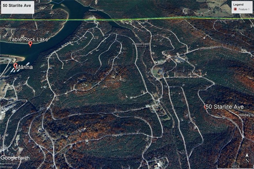 Ready to build your dream home? Quiet and gently wooded, this lot offers the best of both worlds. Enjoy the amenities in Holiday Island like golf courses, a country club, swimming, tennis and a marina with a fishing dock or watch the local fauna from your deck! Nearby Eureka Springs or Rogers offers great shopping and vibrant cultural hubs.