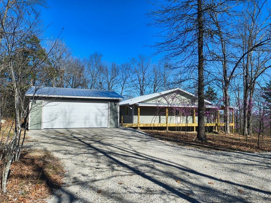 Experience energy-efficient Ozark Home living in this 2BR/2BA brand new built gem. Sitting on 5 level wooded acres m/l. The Home Features 21 SEER HVAC with fresh air intake, foam insulation, and an encapsulated crawl space. Enjoy an open floor plan with a chef’s kitchen: granite/butcher block counters, custom soft-close cabinets, and a 5-burner gas stove. Relax on the wrap-around deck amidst blooming dogwoods and redbuds. The primary suite offers a walk-in closet and private deck access. Includes a 2-car garage, Next Fiber internet, walking trails, and no restrictions on pets or livestock!