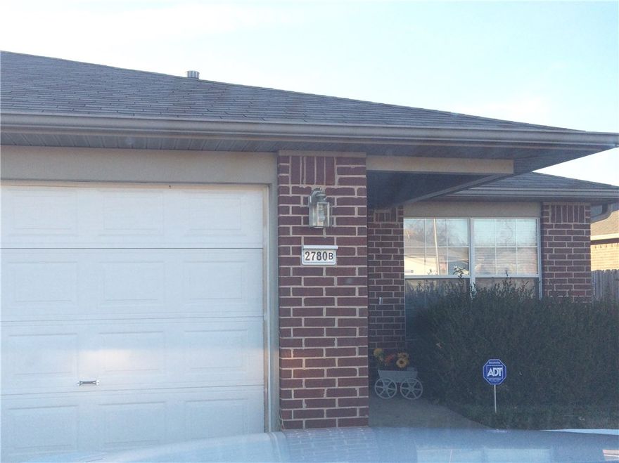 Charming 2 bedroom, 2 bath duplex in Springdale with a bright, open living area and cozy gas fireplace! Kitchen comes fully equipped with full-size refrigerator, electric range, dishwasher, and garbage disposal. Spacious bedrooms with large closets, tub/shower combos, ceiling fans throughout, and a one-car garage. Enjoy the fenced backyard and a prime location near shopping, dining, and everyday conveniences.