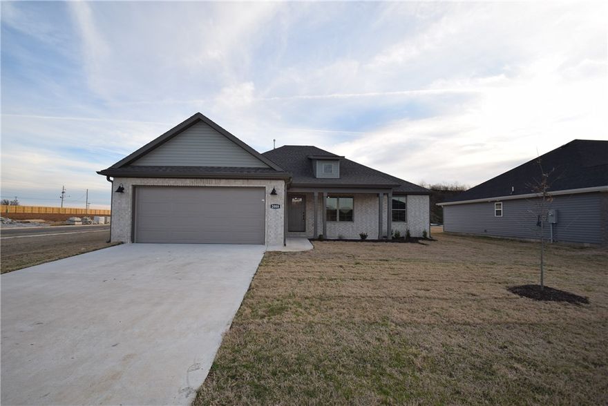 Come home to this beautiful new home located in Siloam's newest community, Endura Park! Upon arrival you will appreciate the large corner lot and inviting front porch which provides excellent curb appeal. Inside, this home opens to a large, open living space and kitchen area. Custom cabinetry, granite countertops, stainless appliances and a large island are make for a dream kitchen perfect for meal prep and hosting family and friends! The home offers spacious bedrooms and a fantastic master suite which boasts a large bedroom and double-vanity bath, and extra large walk-in closet.  And, as if that's not enough, the neighborhood also offers an incredible community pool, resort style pavilion, and playground!  Don't wait! Prices and interest rates are only going up. Schedule your appointment to check out Endura Park today and welcome home!