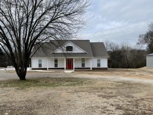 Since 2018 seller has replaced roof with beautiful architectural shingles, windows, gutters, sliding glass door, central heat and air, plumbing, & flooring. The windows, gutters, siding and sliding glass door have lifetime warranty that is transferable to new owners.Beautifully manicured yard. A must see