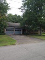 Don't Judge a Book by it's Cover or YOU WILL MiSS OUT ! Featuring a Huge Rock Fireplace, Eat-in Kitchen with a Large Walk in Pantry. 3 Big Bedrooms 2 full Baths, with a Huge Master & Walk in Closet .Two Car Garage with Extra Storage and a Nice Tool Shed out back, makes this Home, One of the Best Deals in Town ! Priced Below Appraised Value !!!!! MUST SEE !