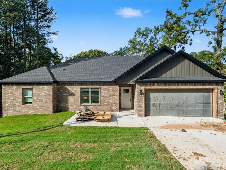Welcome To Your Next Home! This One’s Tucked Near Lake Loch Lomond, A Perfect Spot To Be In The Middle Of It All. Inside, You’ll Love The Wide Open Living Area With A Corner Fireplace And Easy Furniture Flow, All Under 9-Foot Ceilings. The Kitchen Brings The Heat: Granite Counters, Custom Cabinets, Island Seating, Tile Backsplash, Under-Cab Lighting, And A Pantry That Actually Fits Stuff. The Primary Suite Is A Whole Vibe With A Big Walk-In Closet Along With A Soaker Tub, Tile Shower, And Dual Vanities In The Primary Bath. Two More Bedrooms Share A Hall Bath—Also With A Dual Vanity (yes, really). Out Back, A Covered Deck With Stairs Takes You Down To A Yard That’ll Be Freshly Sodded.