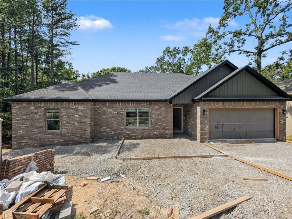 Welcome To Your Next Home! This One’s Tucked Near Lake Loch Lomond, A Perfect Spot To Be In The Middle Of It All. Inside, You’ll Love The Wide Open Living Area With A Corner Fireplace And Easy Furniture Flow, All Under 9-Foot Ceilings. The Kitchen Brings The Heat: Granite Counters, Custom Cabinets, Island Seating, Tile Backsplash, Under-Cab Lighting, And A Pantry That Actually Fits Stuff. The Primary Suite Is A Whole Vibe With A Big Walk-In Closet Along With A Soaker Tub, Tile Shower, And Dual Vanities In The Primary Bath. Two More Bedrooms Share A Hall Bath—Also With A Dual Vanity (yes, really). Out Back, A Covered Deck With Stairs Takes You Down To A Yard That’ll Be Freshly Sodded. Home's Just Getting Started—Still Time To Choose Some Finishes. *** Sample pics from a previous build shown—actual finishes may vary. Under construction pic of actual home