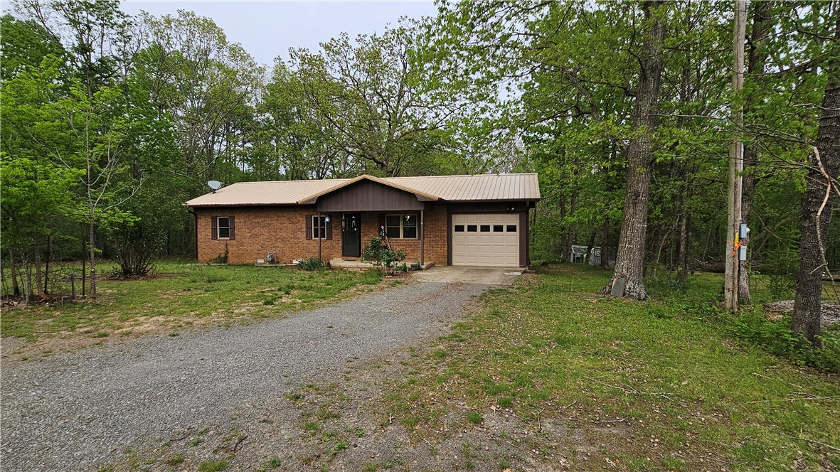 Presenting a well maintained residence just 1.8 miles from Clinton on U.S. 65. This property offers 3 well-appointed bedrooms and 1.5 bathrooms, ideal for starter families seeking a comfortable living space.
The home features a modern kitchen with new granite countertops. A recently installed metal roof adds to the home's longevity and reliability.
Equipped with an upgraded HVAC system, this residence ensures optimal climate control throughout the year. The use of natural gas for heating, water heating, and cooking contributes to energy efficiency and cost savings. A heat pump provides effective cooling during the warmer months.
The brick exterior offers minimal maintenance requirements, allowing for more leisure time. The rear porch is an excellent venue for hosting gatherings, and cookouts, providing a sheltered space for year-round enjoyment.
This property combines convenience with comfort in a prime location. Schedule a visit today to explore the numerous features and benefits this home has to offer.